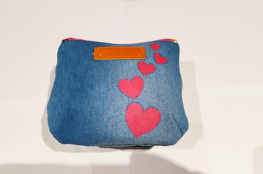 Heart studded denim pouch